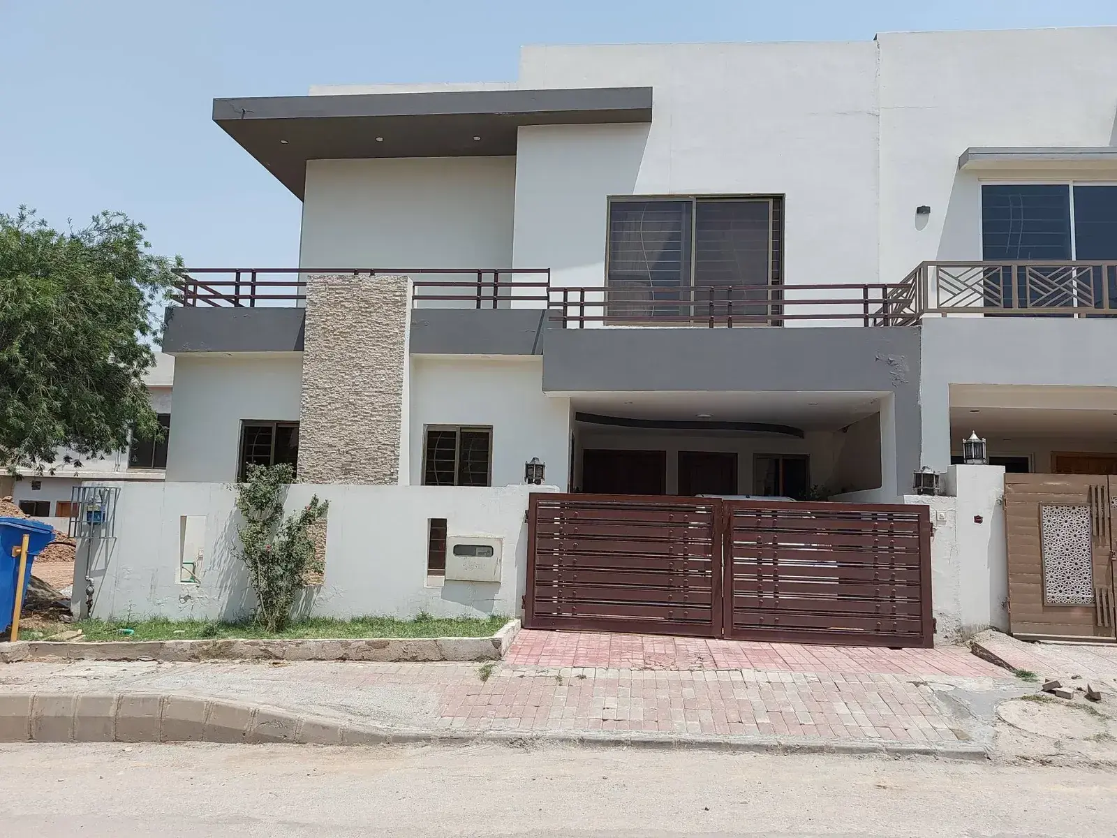 Modern home with stone-clad feature, delivered by EEZY HOMES in Bahria Town Phase 8, Rawalpindi (photo 1 of 2)